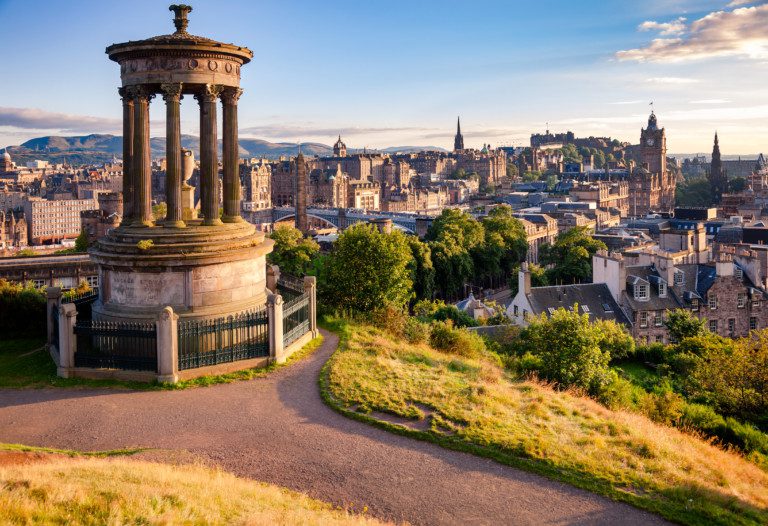 Edinburgh skyline as viewed from the Calton Hill with the Dugald Stewart Monument in foreground